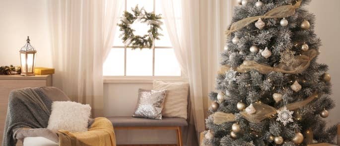 A christmas tree in a neutral living room