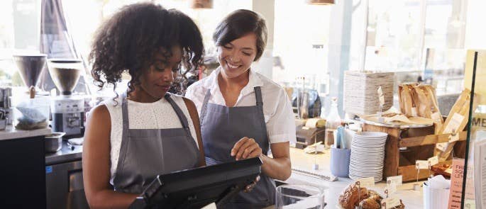 Baristas working in a coffee shop