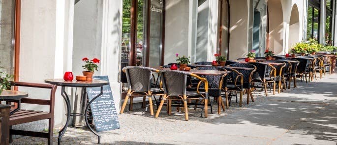 Tables and chairs outside a cafe