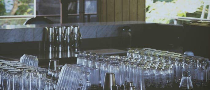 Clean, stacked glasses in a closed restaurant