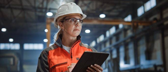 Construction worker investigating a workplace