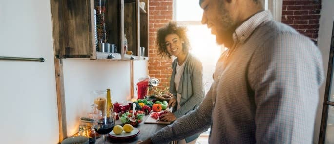 Couple preparing plant based meal