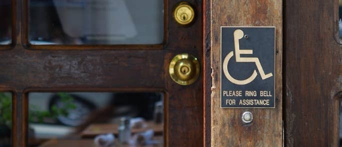 Disability sign at restaurant entrance