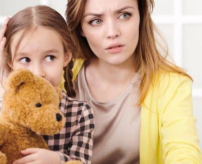 parent-and-child-talking-to-doctor