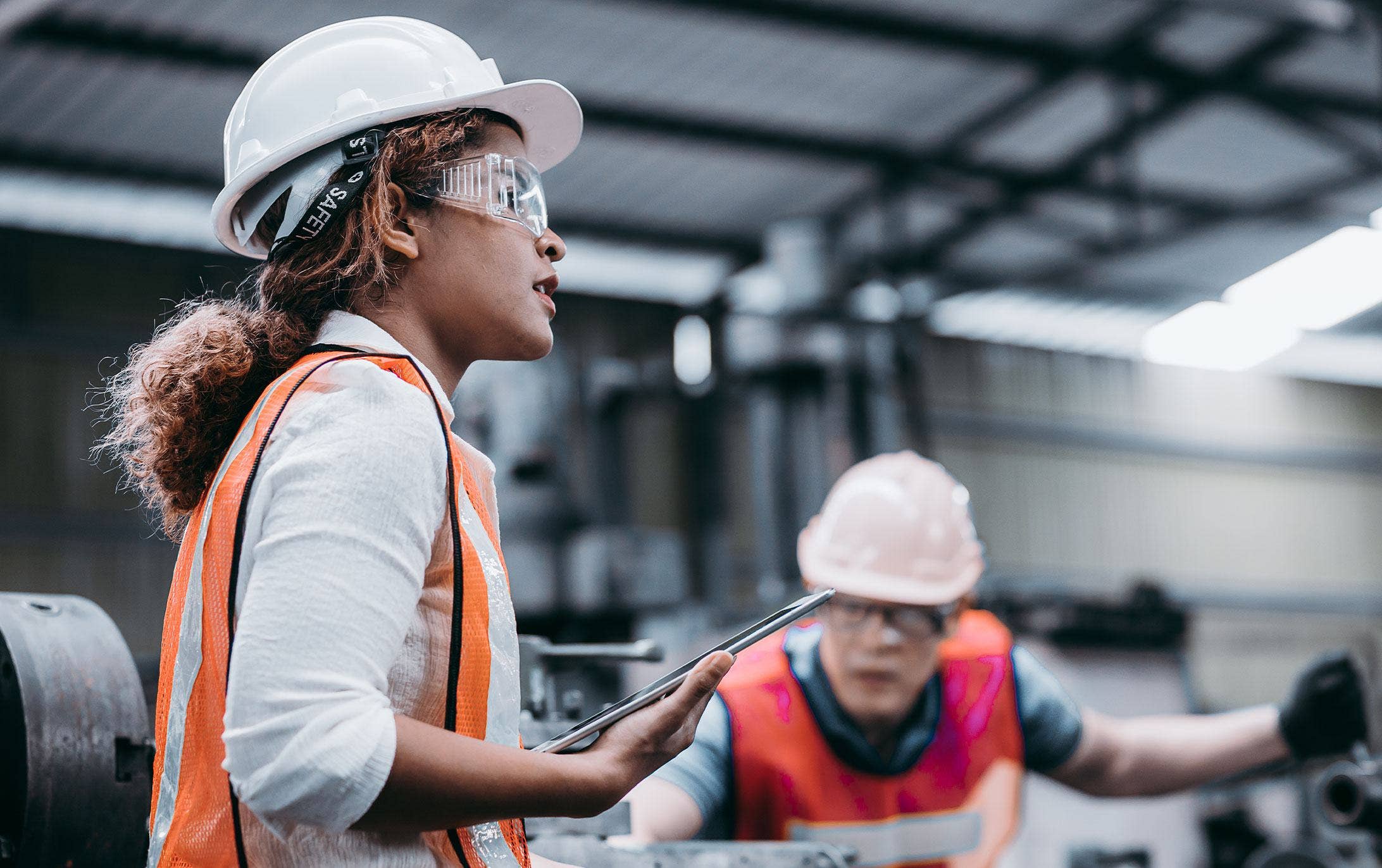 Woman inspecting safety in the workplace