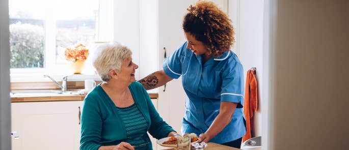 Nurse providing domiciliary care in a lady's home