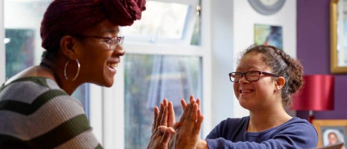 Social care worker interacting with service user