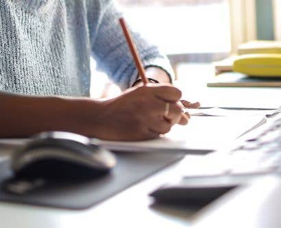 person studying free training resources at computer