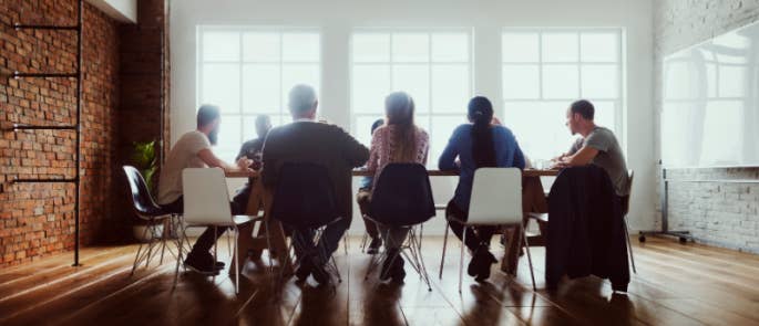 A chairperson leading the meeting at work