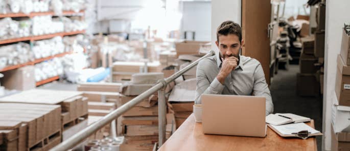 Manager working on his computer in an office