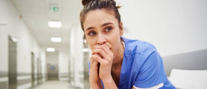 Nurse looking worried in hospital