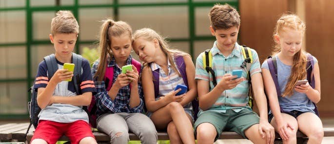 Group of children on their phones