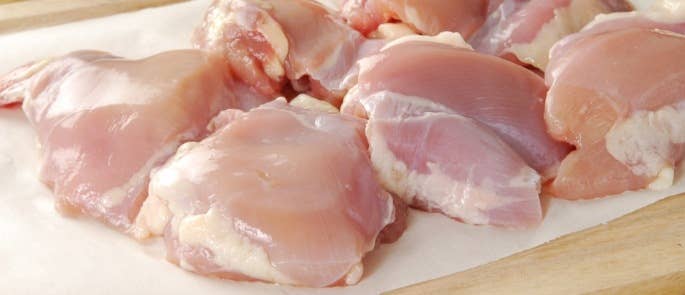 Raw chicken on a cutting board