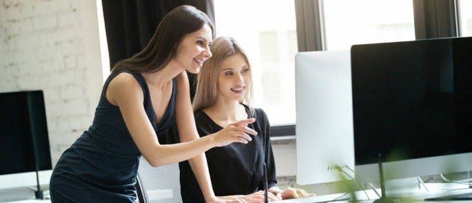 woman helping her manager at work