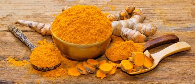 The spice turmeric in root and powder form