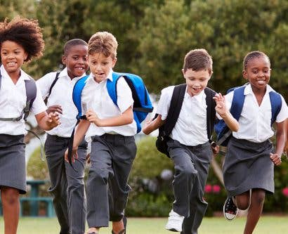 children running and enjoying school