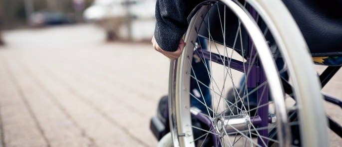 Man in wheelchair evacuating a building