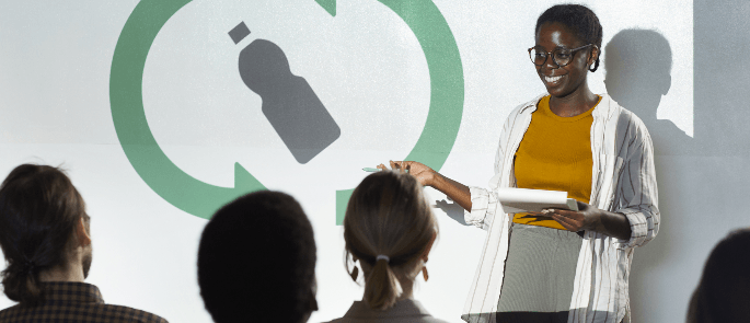 woman presenting at a corporate event 