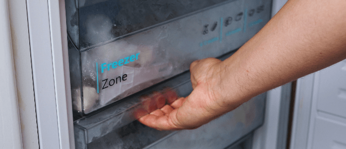 A freezer drawer being opened