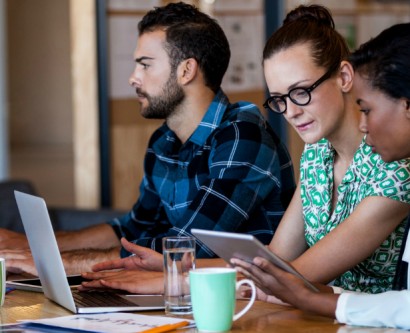 Employers working on computer and ipad